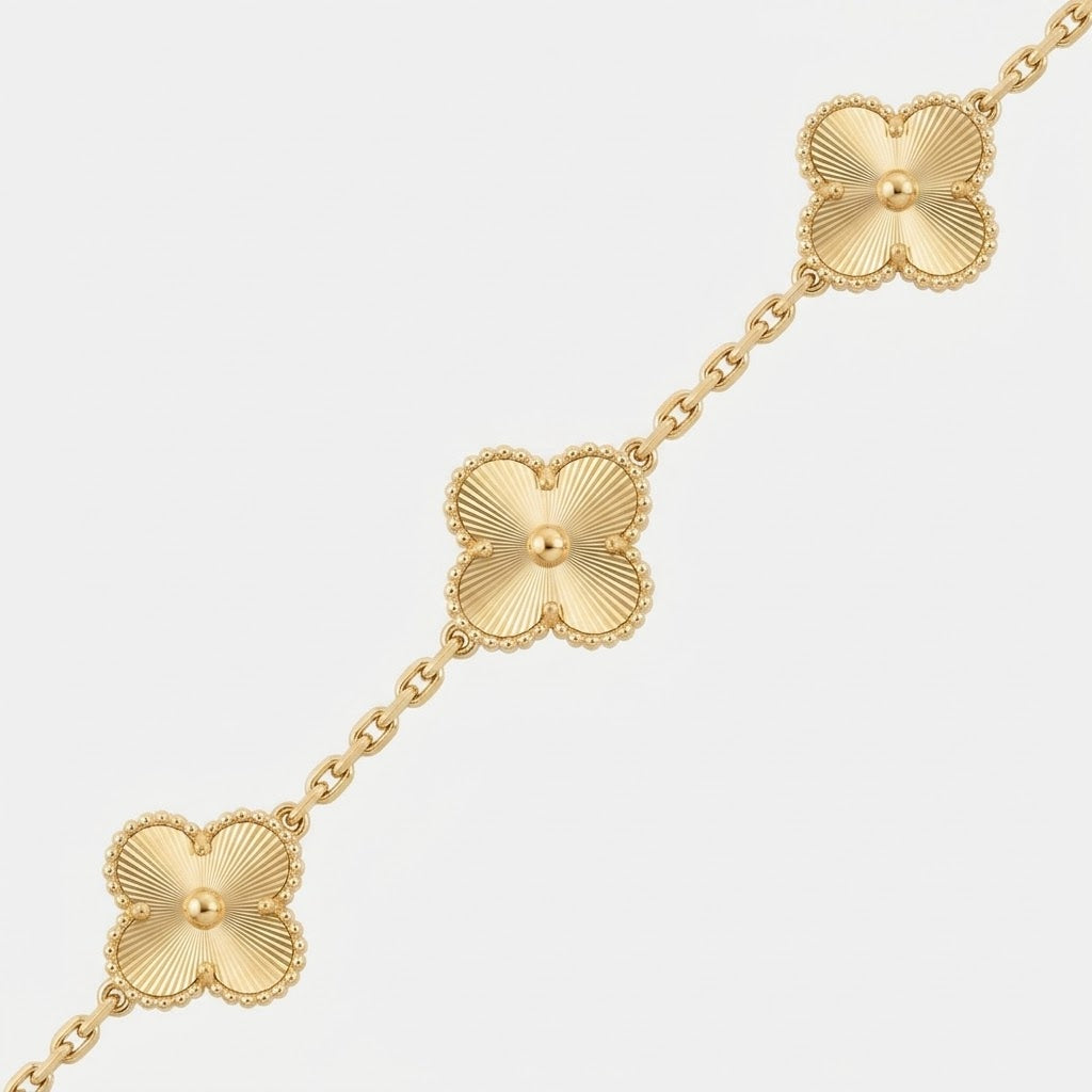 The Collective’s Gold On Gold Clover Bracelet