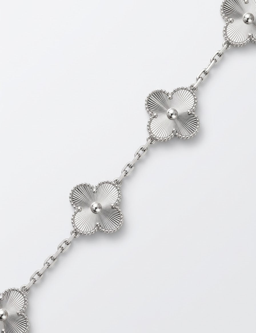 The Collective’s Silver On Silver Clover Bracelet.